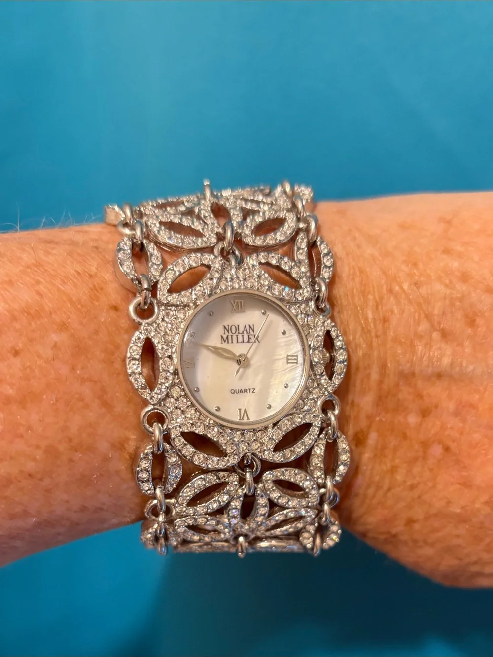 nolan miller watch stunning  silver tone rhinestone floral 7.5” needs battery